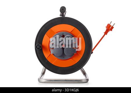 Heavy duty extension cord industrial reel retractable cable with multi-plug extensions retractor for garden or frame for use in a garage workshop isol Stock Photo
