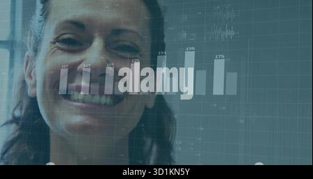 Smiling adult woman wearing dark top displaying bar chart waveform overlay in dashboard, grid lines Stock Photo