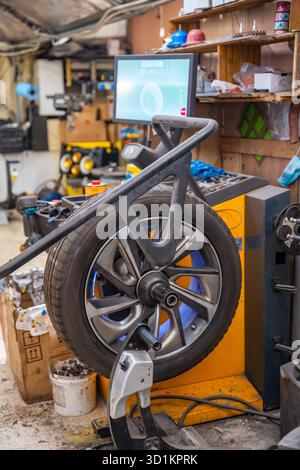Wheel Balance Process Process of wheel balancing at car service, transport concept Stock ...