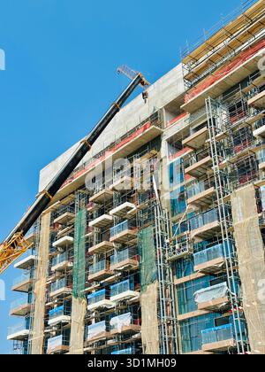 Boom crane on construction site Stock Photo