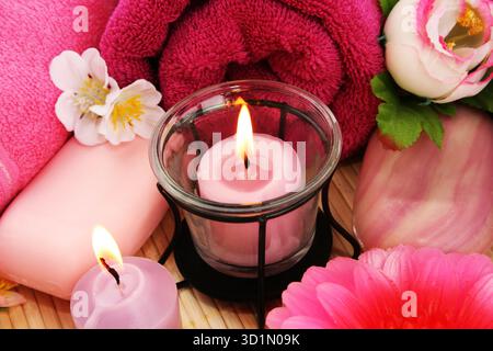 Towels, soaps, flowers, candles Stock Photo