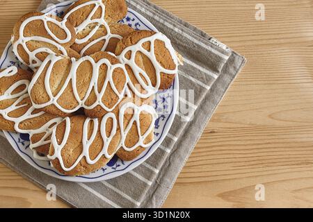Composition with biscuits on a wooden table with sugar and teaspoon Stock Photo