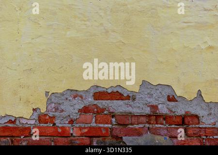 Half plastered wall with beach on beneath, a lot of copy-space Stock Photo