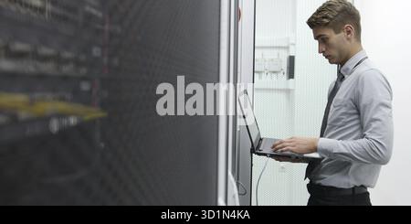 IT expert checking supercomputer server Stock Photo