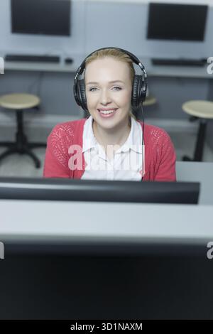 Students learning in computer lab Stock Photo