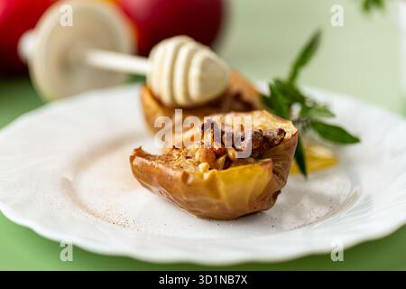 Healthy baked apples stuffed with nuts and aromatic spices. Stock Photo