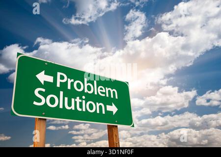 Problem and Solution Green Road Sign Over Clouds Stock Photo