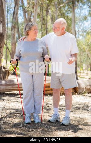 Happy Senior Couple Exercising Outside Together Stock Photo