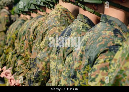 German Bundeswehr soldiers stand in formation wearing combat uniforms ...