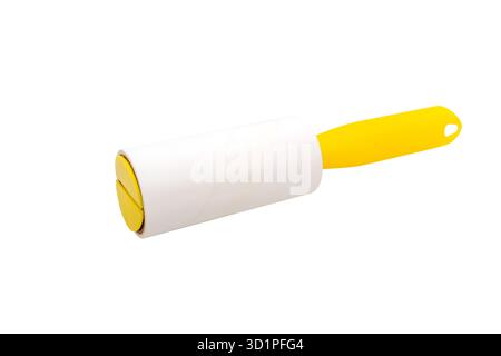 Yellow handle lint roller isolated on white background Stock Photo
