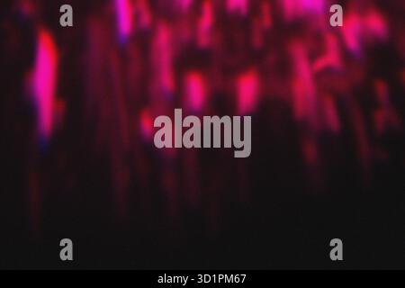 Abstract Pink Magenta and Black Grainy Texture Background with Subtle Spotlight defocused effect. High quality. Stock Photo