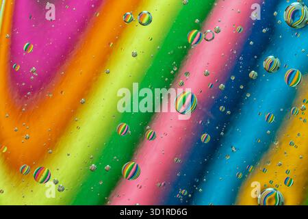 Abstract background of colorful oil drops on water Stock Photo