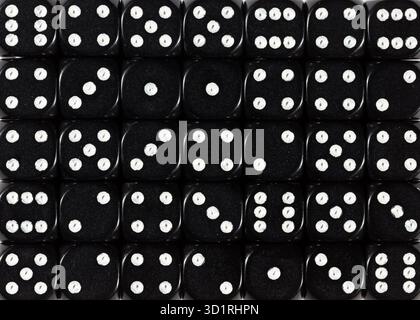 Background pattern of black dices, random ordered Stock Photo