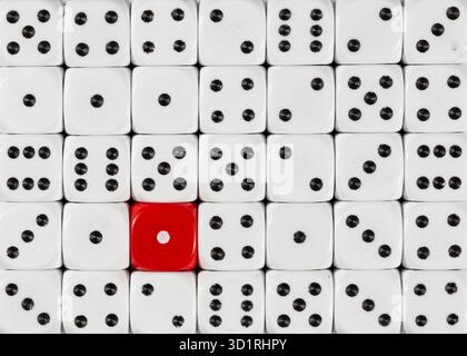 Background of random ordered white dices with one red cube Stock Photo