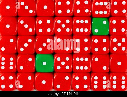 Background of random ordered red dices with two green cubes Stock Photo
