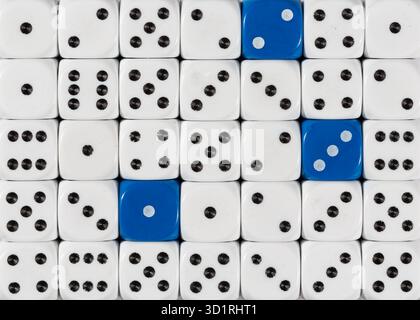 Background of random ordered white dices with three blue cubes Stock Photo