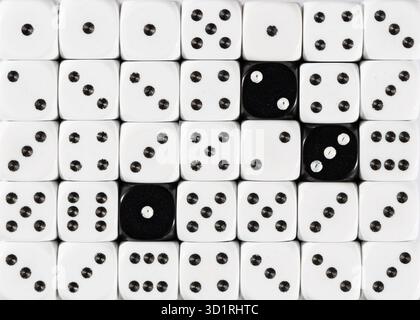 Background of random ordered white dices with three black cubes Stock Photo