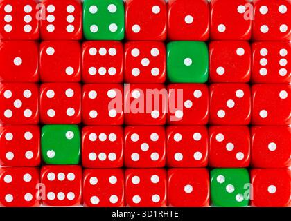 Background of random ordered red dices with four green cubes Stock Photo