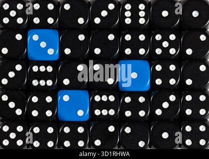 Background of random ordered black dices with three blue cubes Stock Photo