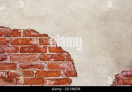 Half plastered brick wall. Half weathered brick wall a lot of copy space.Cracked wall. Aged architecture detail. Grunge brick wall half plastered Stock Photo