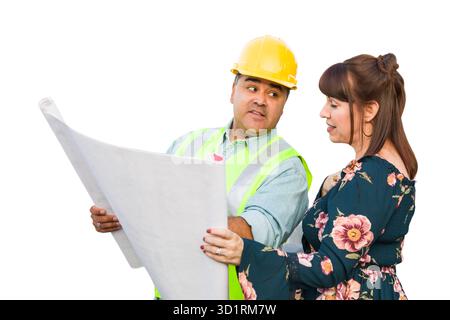 Hispanic Male Contractor Talking with Female Client Over Blueprint Plans Isolated on a White Background Stock Photo