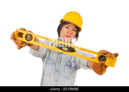 Hispanic Female Contractor Holding Level Wearing Hard Hat Isolated on White Background Stock Photo