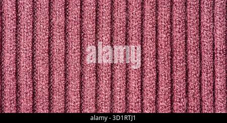 Burgundy fabric texture macro photo as background. Burgundy knitted background Stock Photo