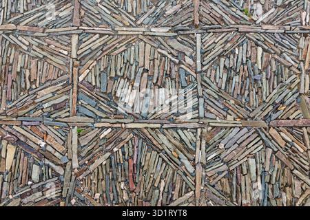 Pavement background symmetry of colorful slate stones Stock Photo