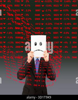 business man hiding his face behind paper with negative market data backgroundstock Stock Photo