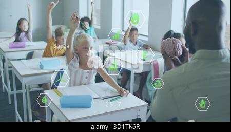 Holding brain model, teacher teaching class in classroom with desks, pencils, analytics, copy space Stock Photo