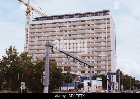 Apartment building in the Grunaer Str. 5 in 01069 Dresden. A construction site is visible due to the refurbishment of the house from the 1960s. Stock Photo