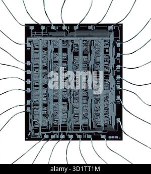 Early silicon microchip from the 1980s. Stock Photo