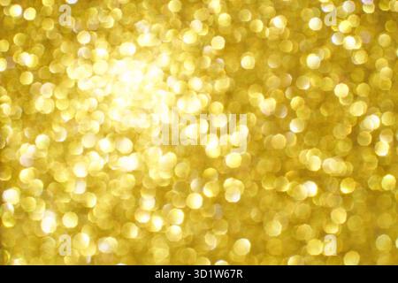 Bokeh circle with gold sparkles background. Yellow glitter backdrop. Golden texture Stock Photo