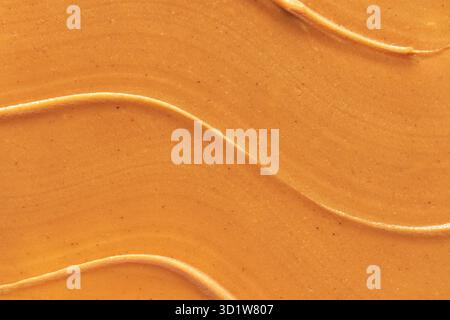 Peanut butter texture. Spread swirl. Organic keto food Stock Photo