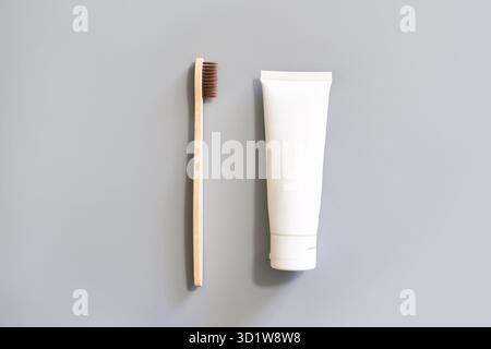 Ecology toothbrush on grey background. Brush on table. Sustainable mouth product Stock Photo