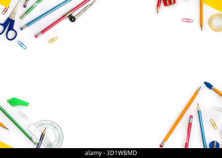 Back to School. Frame of school supplies ( pencil, scissors, sharpener, clips, crayons ) on a white background with space for text. Top view, flat lay Stock Photo