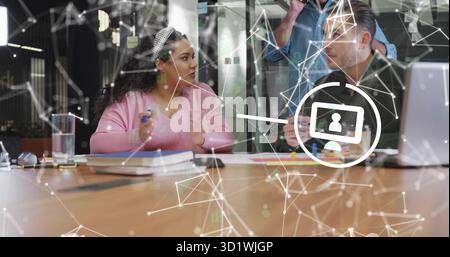 Collaborating three professionals discussing strategy in meeting room, with laptop and sticky notes Stock Photo