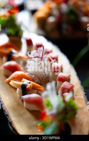 Assorted Sushi Nigiri on Wooden Platter Stock Photo
