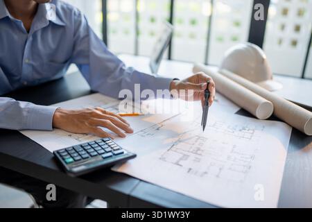 Architecture Man drawing on architectural Creative project business architecture building construction Industrial engineering Ac Stock Photo