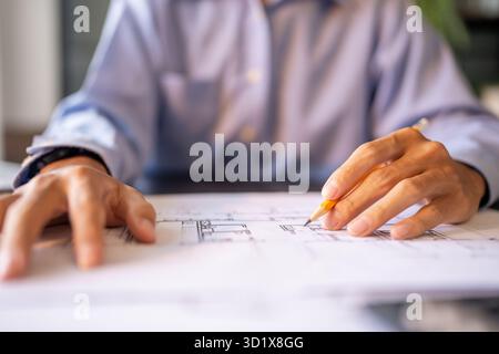 Architecture Man drawing on architectural Creative project business architecture building construction Industrial engineering Ac Stock Photo