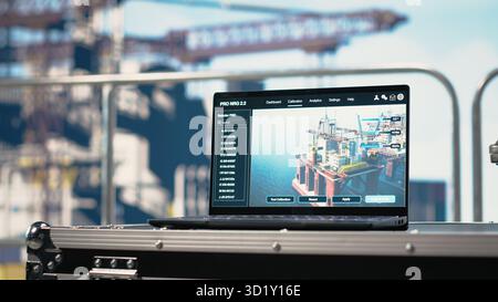 Laptop on drilling rig ship with software dashboard used for anomaly ...