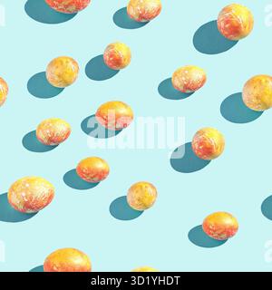 Golden red eggs. Pattern at blue background. Easter trendy concept. Minimal hipster design. Healthy food. Traditional bright gro Stock Photo