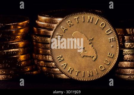 Golden Coin with Map of Martinique Stock Photo