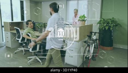 Walking Asian man wearing shirt with crossbody bag in bank reception area, with hexagonal graphics Stock Photo