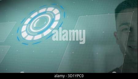 Interacting mid adult Indian man controlling grid with HUD panels and crosshair markers, copy space Stock Photo