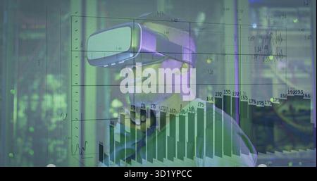 Interacting man wearing casual shirt manipulating digital charts in data center, with VR headset Stock Photo