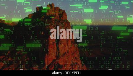Dominating red-brown sandstone mesa rising atop desert plain, showing green binary code overlay Stock Photo