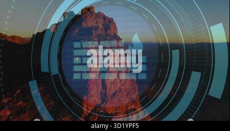 Displaying blue HUD overlay on red sandstone monolith in desert canyon at sunset, binary streams Stock Photo