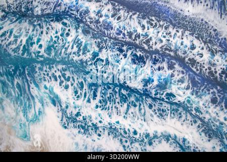 Dynamic ocean wave patterns with foamy blue and white textures show natural Stock Photo