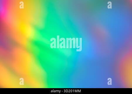 Colorful abstract rainbow gradient background with soft blurred edges and vibrant hues. Stock Photo